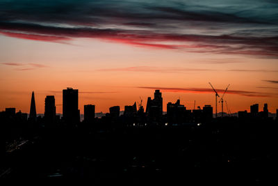 Cityscape against sky during sunset