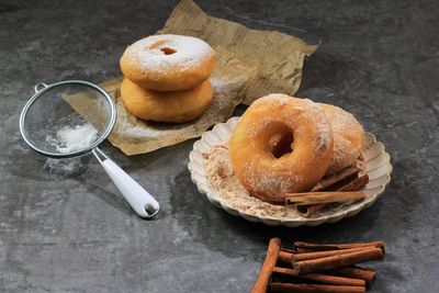 Homemade fresh fried donuts frosted with cinnamon and sugar