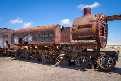 Abandoned train against sky