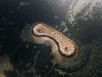 Aerial view of island amidst sea