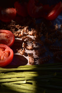 Close-up of red chili peppers on table