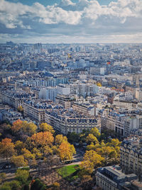 Paris cityscape vertical view from the eiffel tower height, france. fall season scene with color