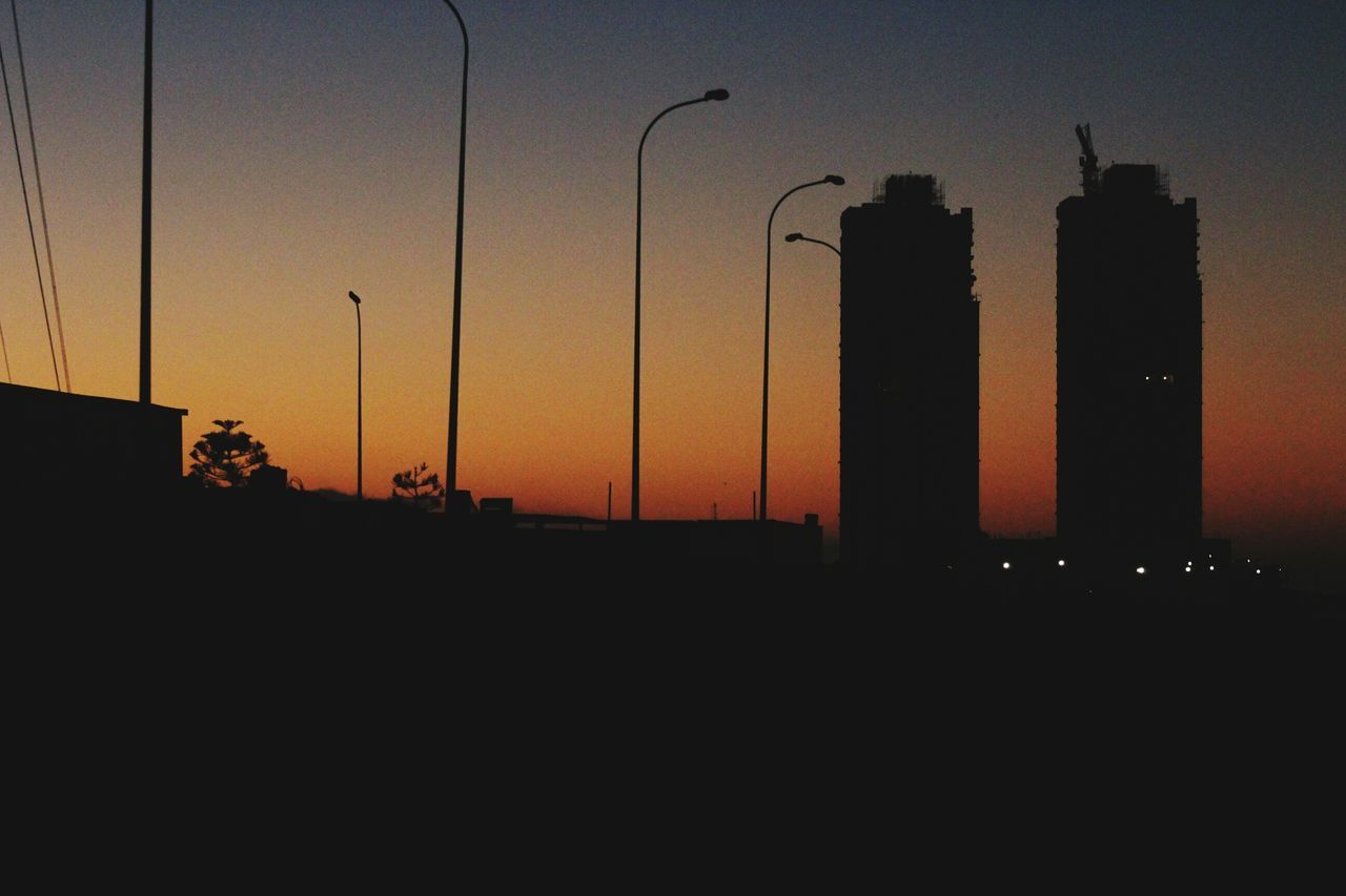 sunset, silhouette, built structure, architecture, building exterior, no people, growth, city, outdoors, sky, nature, day