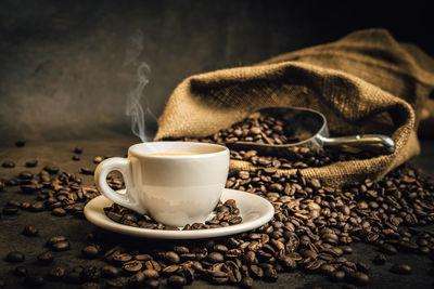 Close-up of coffee cup on table