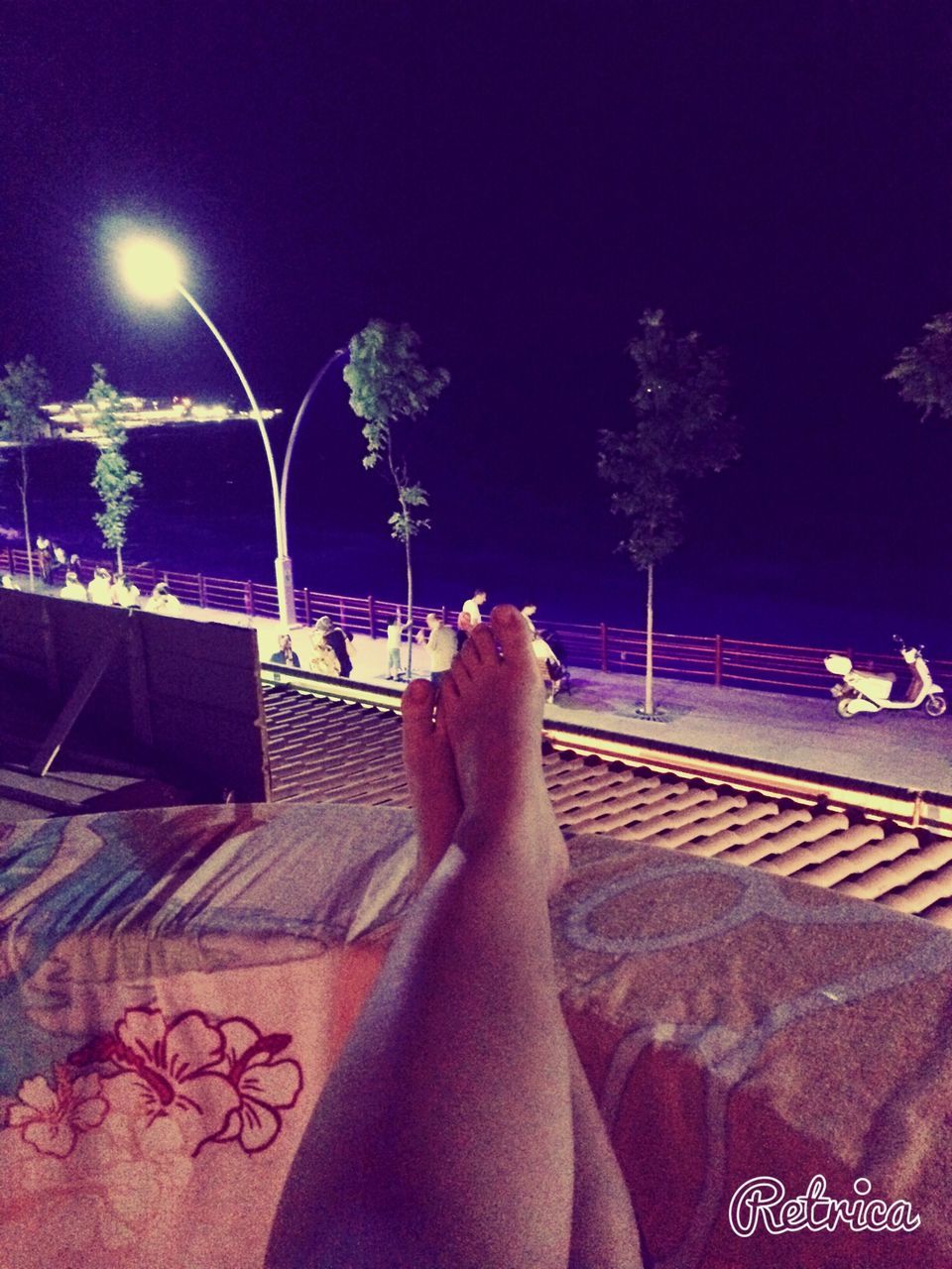 lifestyles, leisure activity, low section, person, personal perspective, relaxation, men, barefoot, night, illuminated, unrecognizable person, sitting, human foot, part of, swimming pool