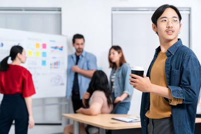 Young man working in office