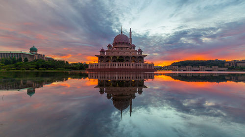 Scenic view of lake against sky during sunset