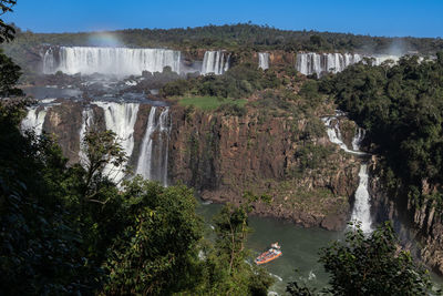 Iguazu falls scenic view of waterfall in forest