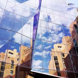 Low angle view of modern building against sky