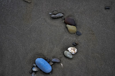 High angle view of stones on beach