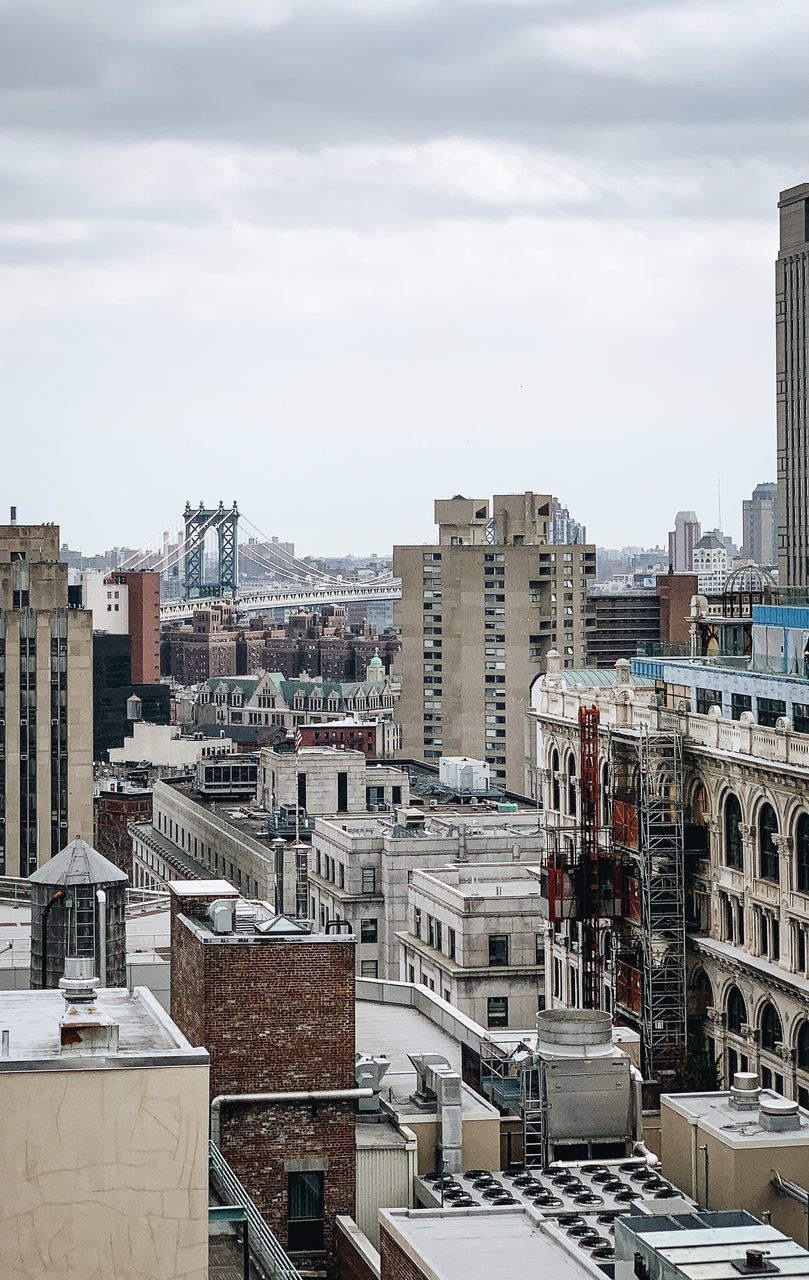 building exterior, architecture, built structure, city, sky, building, cityscape, cloud - sky, residential district, day, no people, nature, high angle view, outdoors, development, travel destinations, community, office building exterior, skyscraper, apartment, settlement