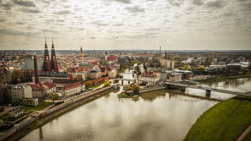 High angle view of river amidst buildings in city