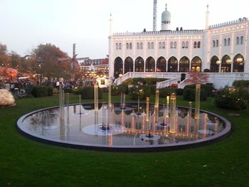 Gazebo in park against sky in city
