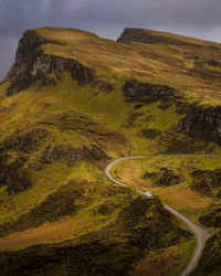 Scenic view of mountain road against sky