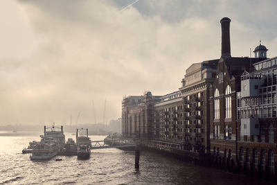 Scenic view of sea and buildings against sky