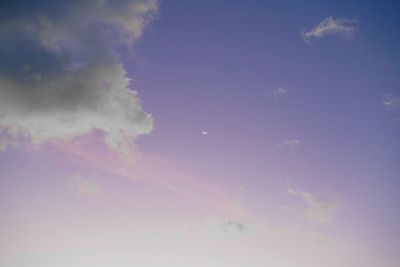 Low angle view of moon in sky