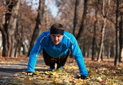 Man exercising at public park