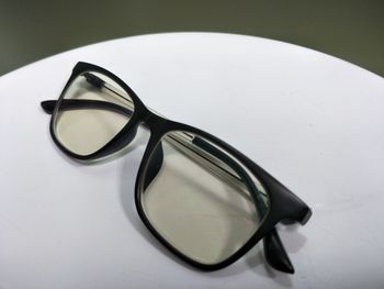 Close-up of sunglasses on table