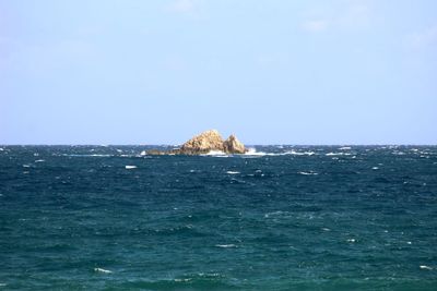 Scenic view of sea against clear sky