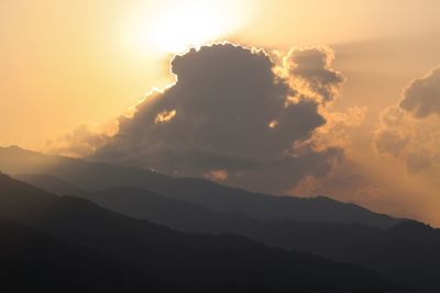 Scenic view of silhouette mountain against sky during sunset