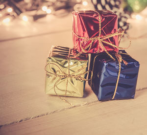 Close-up of christmas presents on table