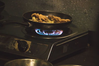 Close-up of meat in cooking pan