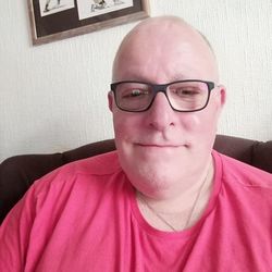 Portrait of man wearing eyeglasses