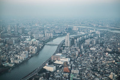 Aerial view of cityscape against sky