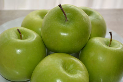 Close-up of apples on table