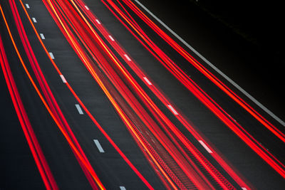 High angle view of light trails on road