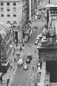 High angle view of vehicles on road in city