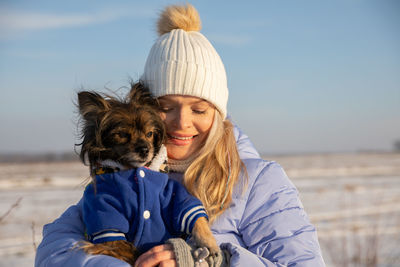 Portrait of woman with dog