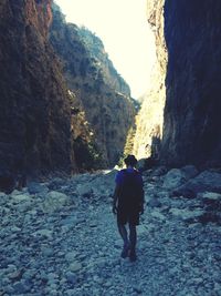 Man standing on rock formation