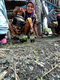 Full length of woman working
