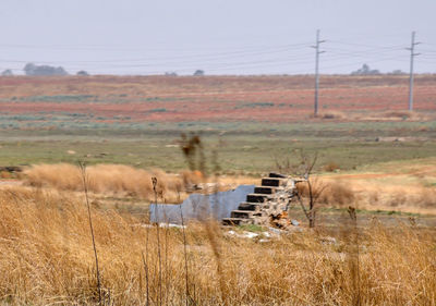 Scenic view of land against sky