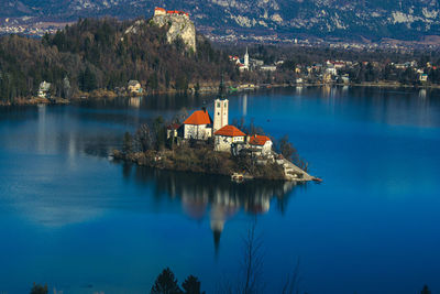 Scenic view of lake and church on island