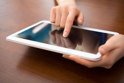 Close-up of woman using mobile phone