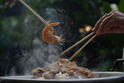 Close-up of person preparing food