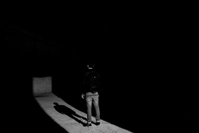 Man standing in the dark