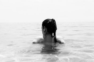 Young woman in the sea