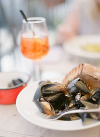 Close-up of served food in plate on table