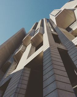 Low angle view of building against blue sky