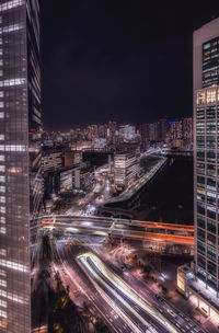 High angle view of illuminated city at night