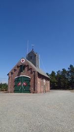 View of building against clear blue sky