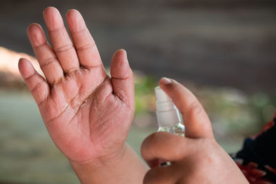 Midsection of person holding hands