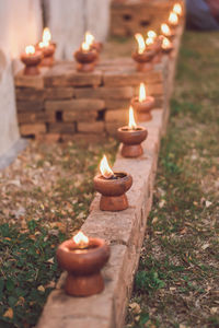 Close-up of burning candles