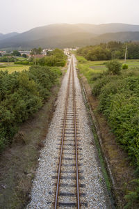 Railroad track against sky