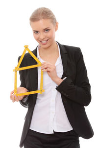 Portrait of a smiling young woman over white background