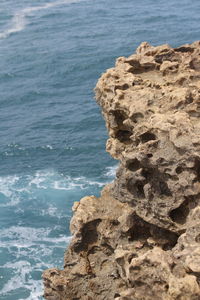 High angle view of rock formation on beach