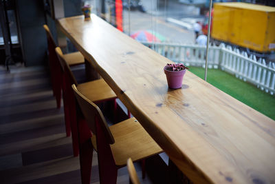 High angle view of empty chairs and tables in restaurant